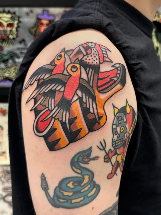 Big American Traditional Panther Devil Snake Tattoo on Men Arm by @javiergarciatattoo