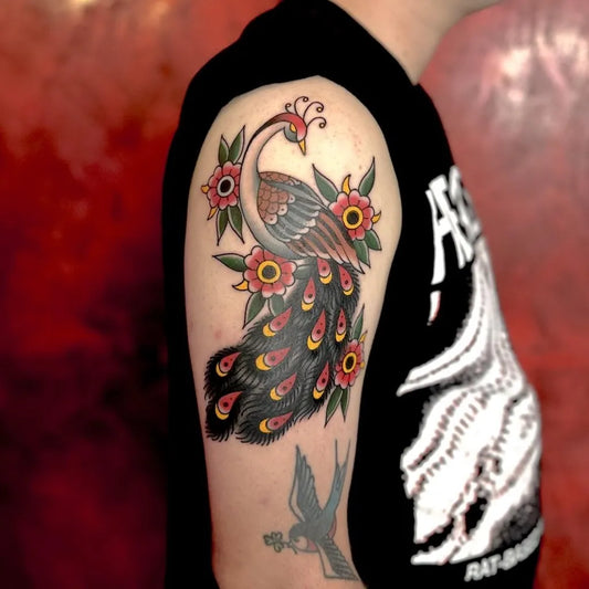 Big American Traditional Peacock and Flowers Tattoo on Men Upper Arm by @sixtyink