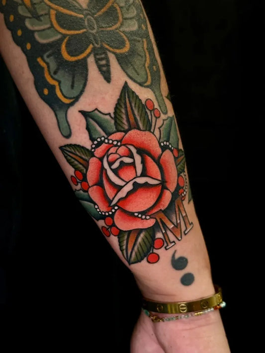 Big American Traditional Rose Butterfly Holly on Women Arm Tattoo by @charlie.rufino.21