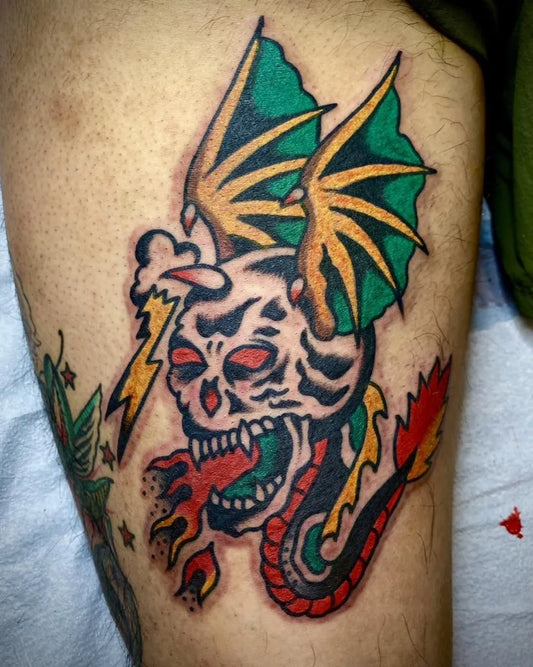 Big American Traditional Skull with Lightning Wings Dragon on Men Thigh Tattoo by @bas.tattoos