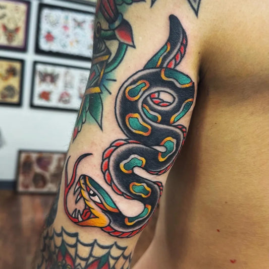 Big American Traditional SnakeSpider Web on Men Arm Tattoo by @takumi_ink