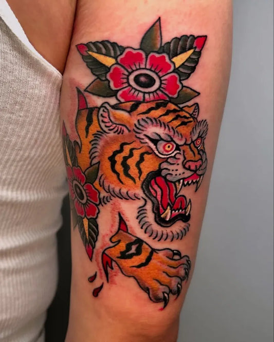 Big American Traditional Tiger and Flowers on Women Arm Tattoo by @alxbngala