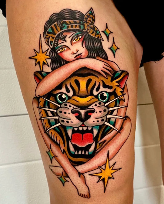 Big American Traditional Woman Embracing Tiger on Women Thigh Tattoo by @crisi.tattoos