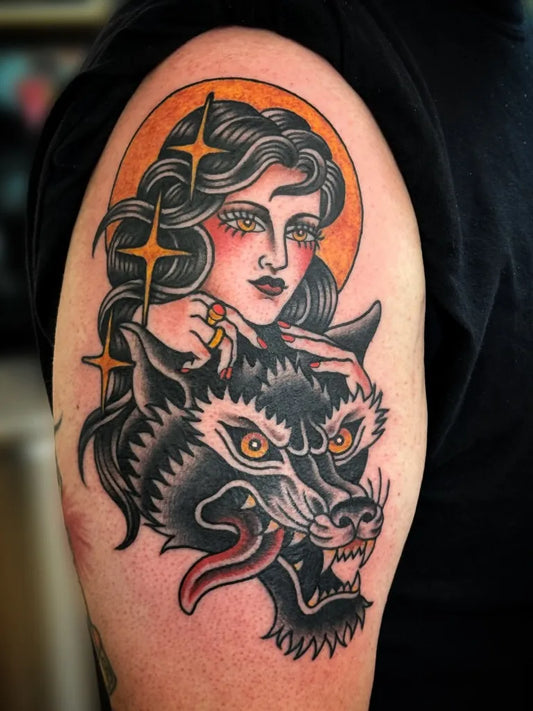 Big American Traditional Woman with Wolf on Men Arm Tattoo by @tezanostattoos