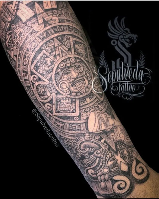Big Aztec Aztec Calendar and Quetzalcoatl Tattoo on Men Arm by @mexicanstyle_tattoos