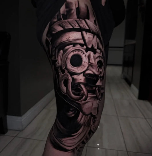 Big Aztec Mask Tattoo on Men Thigh by @vibrationss_