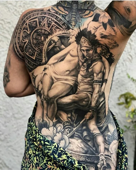 Big Aztec MayanCalendarChiefAndWarrior Tattoo on Women Back by @mexicanstyle_tattoos