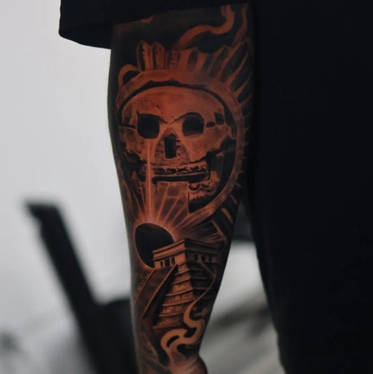 Big Aztec Skull Pyramid Sun Tattoo on Men Leg by @chrisrubiotattoos