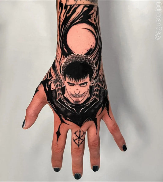 Big Berserk Guts on Men Hand Tattoo by @agusto.jpg