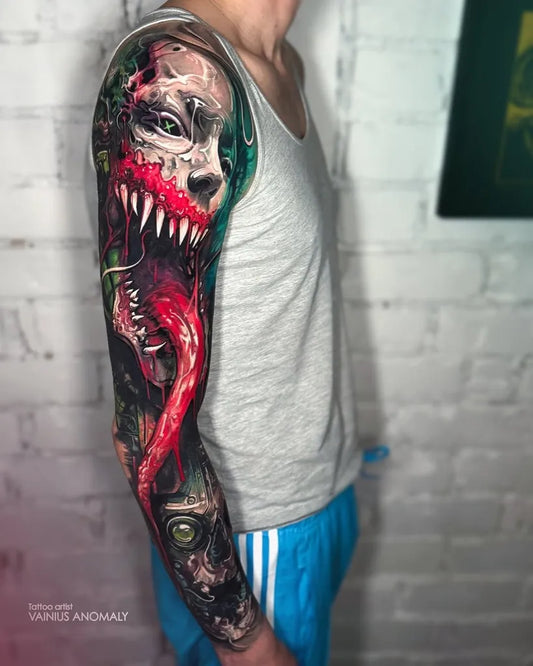 Big Bio Mechanical Venom Symbiote on Men Arm Tattoo by @tattooassist