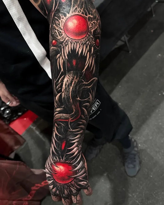 Big BioOrganic DemonicEyesTentacles on Men Arm Tattoo by @tattoosfolder
