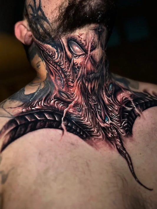 Big BioOrganic Horror Monster on Men Neck Tattoo by @ryantaylortattoos