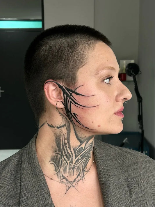 Big Biomchanical Branching Vines on Women Face Tattoo by @canoabroken