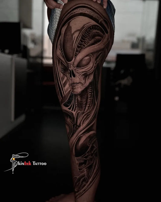 Big Biomechanical Alien Tattoo on Women Thigh by @skinink_tattoo_bangalore