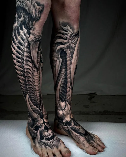 Big Biomechanical Skeleton Dragon on Men Leg Tattoo by @inked.world_