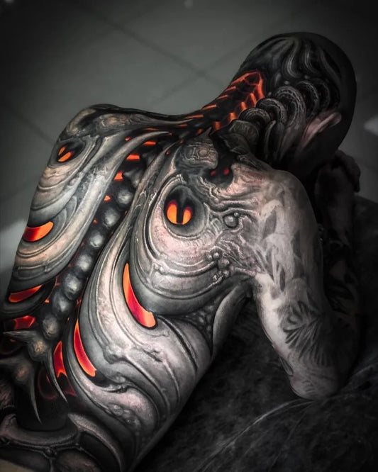 Big Biomechanical Spine Dragon on Men Back Tattoo by @tattooassist