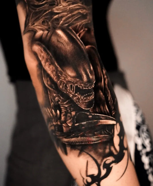 Big Black and Grey Alien Tattoo on Men Arm by @value.tat