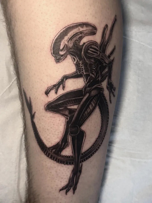 Big Black and Grey Alien Tattoo on Men Leg by @etherealgrace.tattoo
