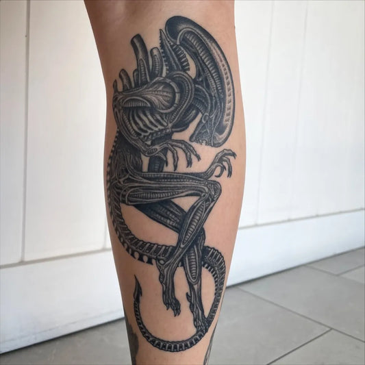Big Black and Grey Alien Tattoo on Women Leg by @siarnthecatwitch