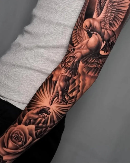 Big Black and Grey Angel Dove and Roses Tattoo on Men Arm by @alemarianitattoo