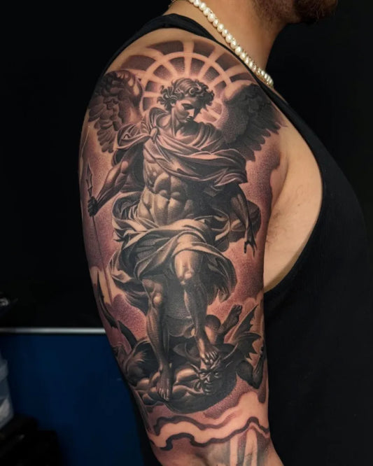 Big Black and Grey Angel Slaying Demon on Men Arm Tattoo by @fullerton_tattoo