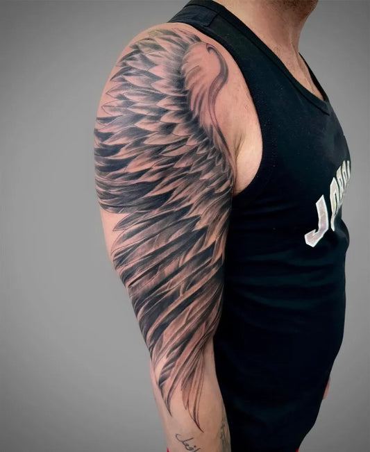 Big Black and Grey Angel Wings Tattoo on Men Shoulder by @inksane_needles