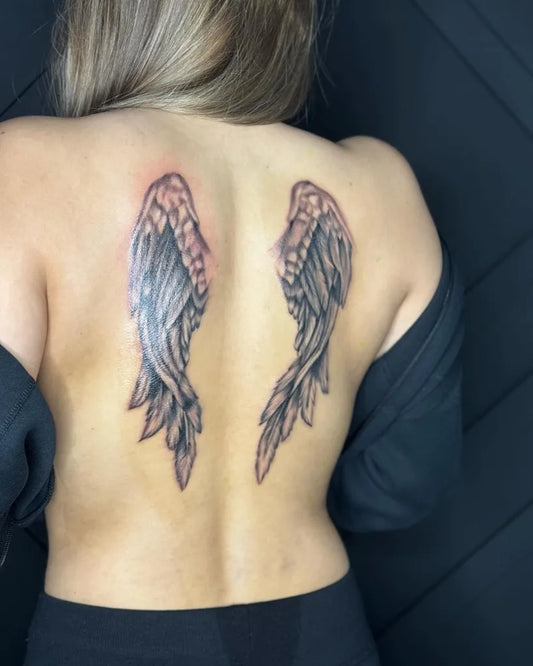 Big Black and Grey Angel Wings Tattoo on Women Back by @lukedavistattoo