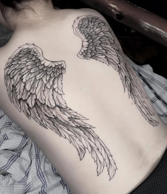 Big Black and Grey Angel Wings Tattoo on Women Back by @rozieink