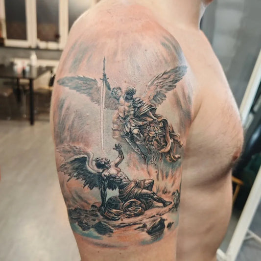 Big Black and Grey Angel battling demon on Men Arm Tattoo by @macavei_brothers_ink