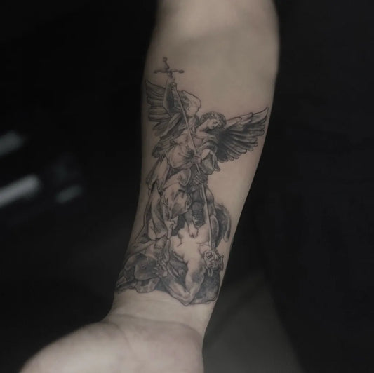 Big Black and Grey Angel slaying dragon on Men Arm Tattoo by @zuhretattoo
