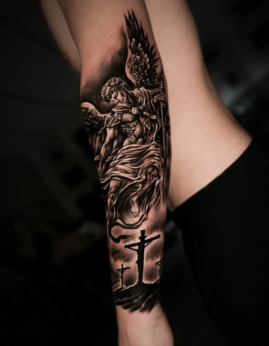 Big Black and Grey Angel with Crosses Tattoo on Men Arm by @tattooheroes