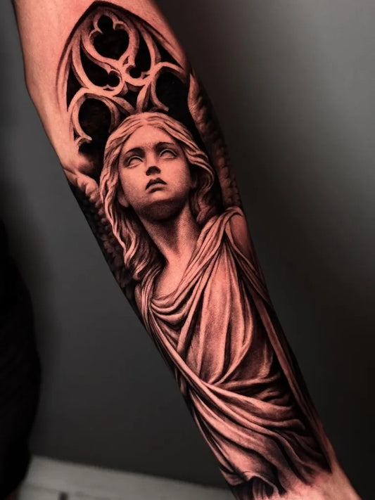 Big Black and Grey Angel with Gothic Window on Women Arm Tattoo by @lorenzo_pascuccii