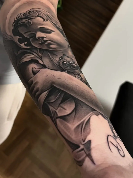 Big Black and Grey Angel with Rose on Men Arm Tattoo by @drobactattoo