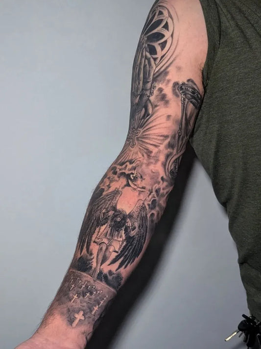 Big Black and Grey Angel with Wings and Cross Military Tattoo on Men Arm by @the_neon_lady