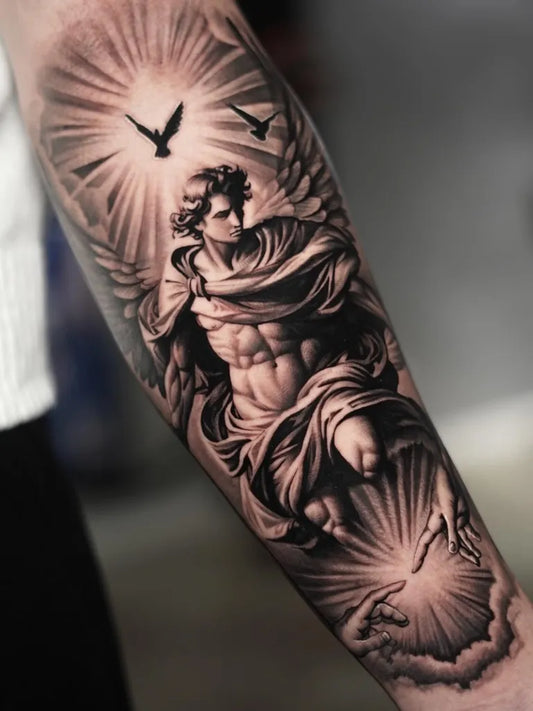 Big Black and Grey Angel with Wings and Radiant Light Tattoo on Men Arm by @iinfinite.art