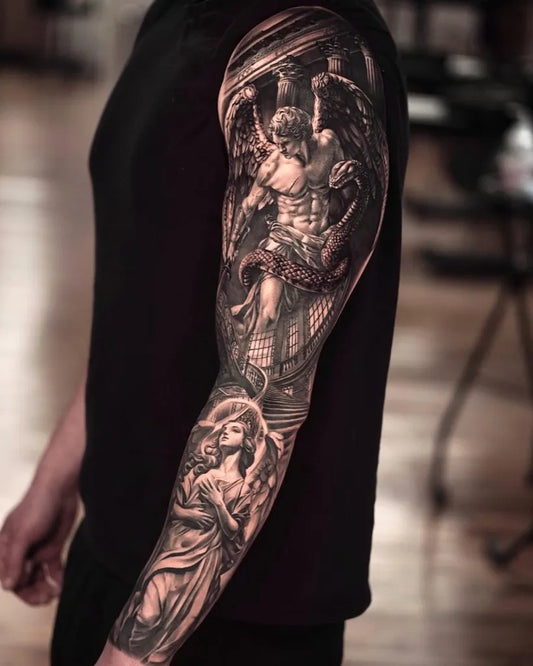 Big Black and Grey Angels and Snake Tattoo on Men Upper Arm by @lamanigancetattootoronto