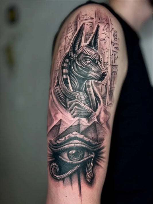 Big Black and Grey Anubis Eye of Horus Tattoo on Men Arm by @harley_q_tattoo