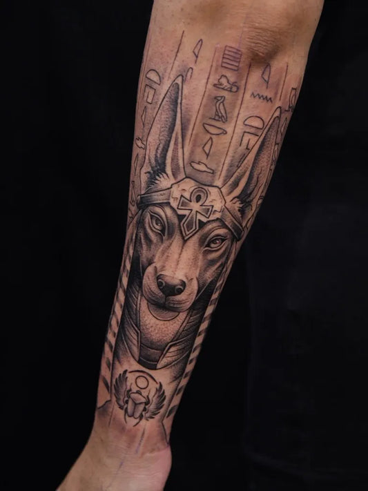 Big Black and Grey Anubis Hieroglyphs Tattoo on Men Arm by @aditya_6006