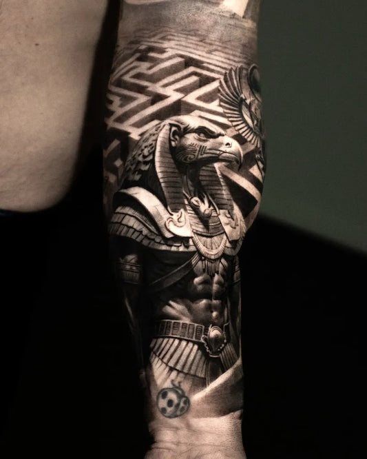 Big Black and Grey Anubis Labyrinth Wings Tattoo on Men Arm by @riccardoprosperi.tattoo