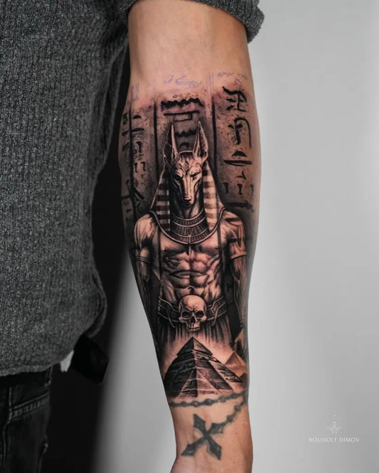 Big Black and Grey Anubis Pyramid Tattoo on Men Arm by @roudolfdimovtattoos