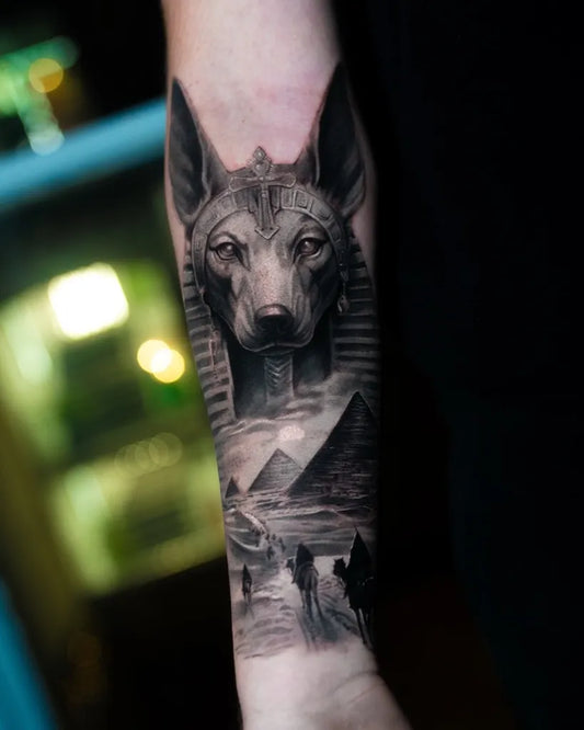 Big Black and Grey Anubis Pyramids Silhouettes Tattoo on Men Arm by @atilla.ink