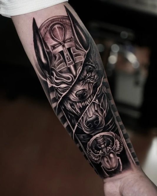 Big Black and Grey Anubis Scarab Tattoo on Men Arm by @supremacytattoo