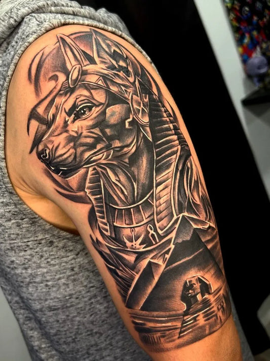 Big Black and Grey Anubis Sphinx Tattoo on Men Arm by @jhonnye_tattoo