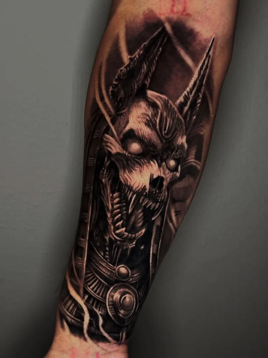 Big Black and Grey Anubis Tattoo on Men Arm by @dlee_tattoo