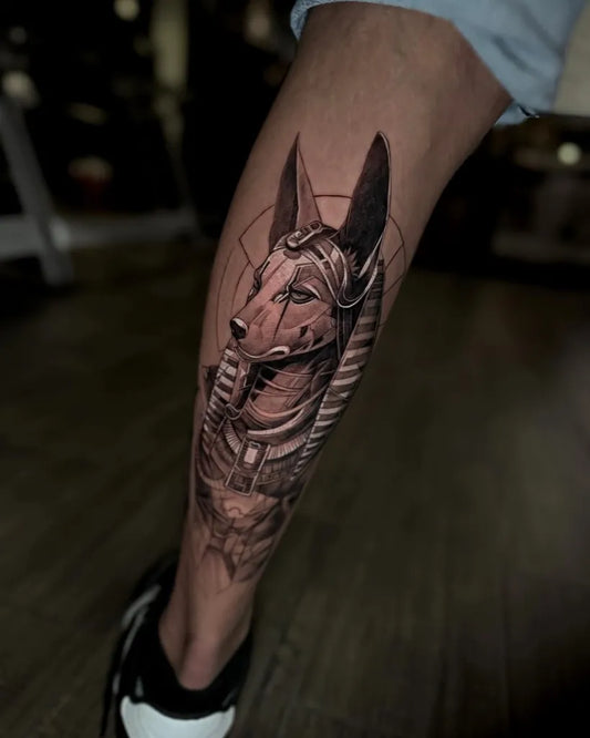 Big Black and Grey Anubis Tattoo on Men Leg by @greckhardyink