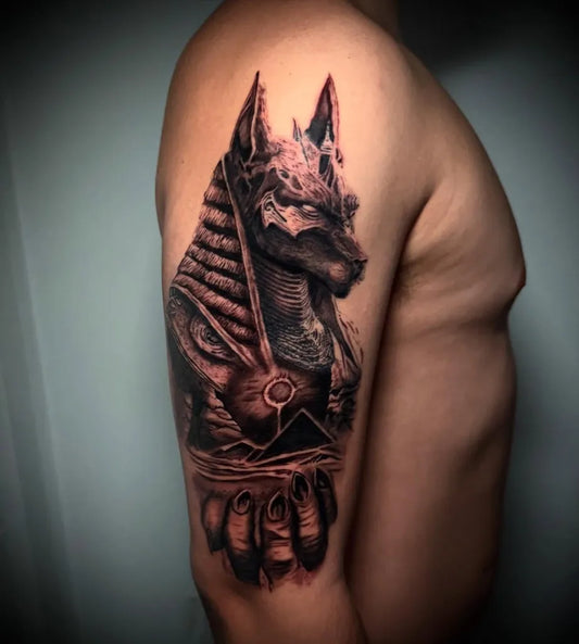 Big Black and Grey Anubis Tattoo on Men Shoulder by @miguelsorianotattoo