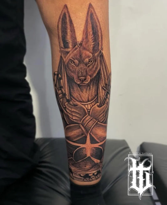 Big Black and Grey Anubis and Ankh Tattoo on Men Leg by @lontratattoo