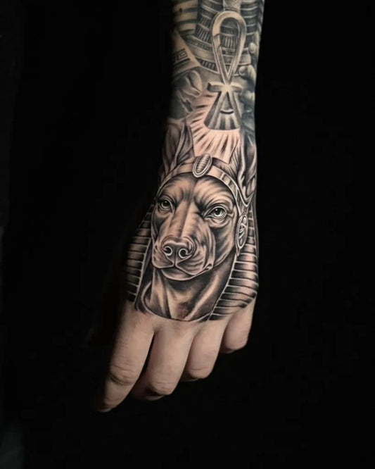 Big Black and Grey Anubis with Ankh Tattoo on Men Forearm by @oliveandweston