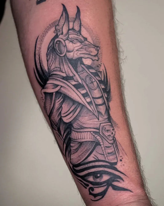 Big Black and Grey Anubis with Eye of Horus Tattoo on Men Arm by @galart.tattoo
