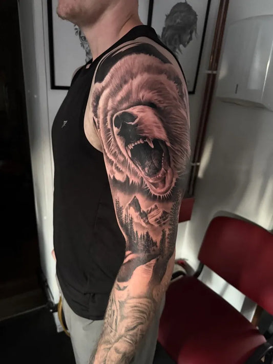 Big Black and Grey Bear Mountains on Men Arm Tattoo by @inkygeorge